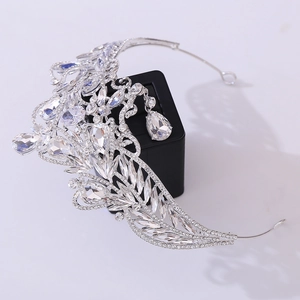 Detailed macro view of the silver bridal crown featuring intricate sparkling rhinestones