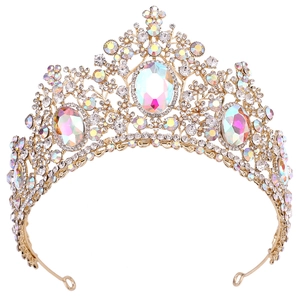 Detailed macro view of bridal crown with AB crystals and intricate gold hollow patterns