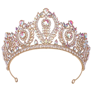 Detailed macro view of Baroque gold bridal crown with shimmering AB colorful crystals