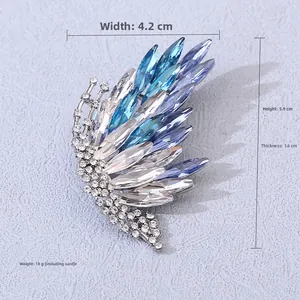 Detail view of crystal butterfly brooch showing dimensions 4.2cm width and 5.9cm height