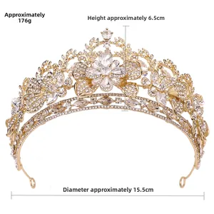 Golden bridal tiara with rhinestones measuring 15.5cm in diameter and 6.5cm in height