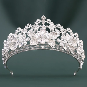 Close-up of luxury bridal tiara with sparkling crystal leaves and rhinestone details
