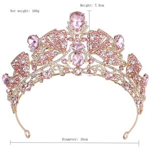 Pink crystal crown with gold alloy base, weighing 160g, 16cm diameter and 7.8cm height