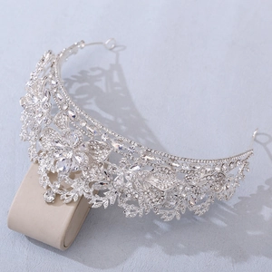 Luxury bridal crown with sparkling rhinestones and silver leaf design for weddings