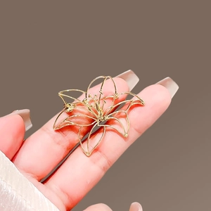 Elegant gold lily flower brooch with hollow design for women suits and fashion accessories