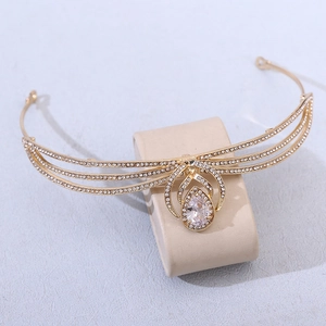 Diadème de mariée doré élégant avec trois bandes de strass et zircon central poire