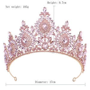 Detailed view of pink crystal tiara with golden alloy frame and stone measurements