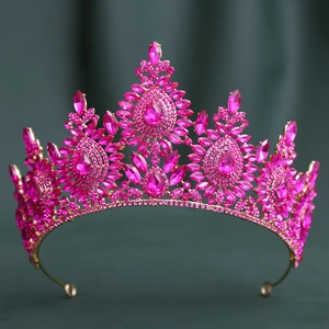 Detail showing the intricate alloy base and vibrant rose pink rhinestones of the crown