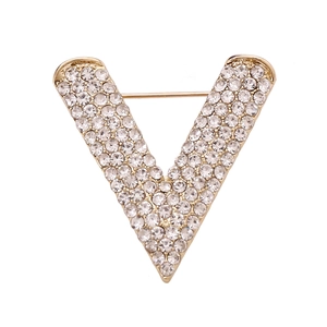 Elegant V-shaped gold brooch with sparkling crystals for suits and coats