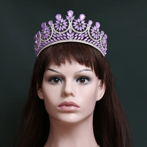 Elegant baroque bridal tiara with purple crystals and sparkling rhinestones on silver band