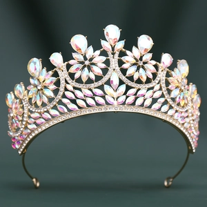 Macro shot of bridal crown with golden alloy frame and iridescent AB crystals