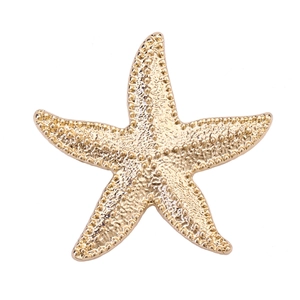 Vintage French style starfish brooch in gold tone alloy with fine textured finish