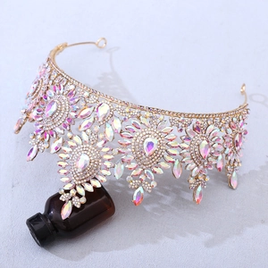 Detail of baroque bridal crown showing golden alloy frame and iridescent AB crystals