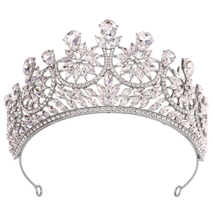 Detailed macro view of silver bridal crown with intricate crystals and sparkling rhinestones