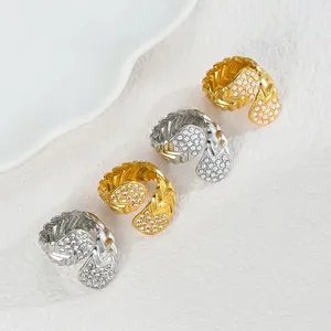 Golden and silver braided stainless steel rings with pearl and zircon inlay textures