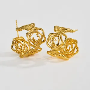 Irregular hollow gold flower earrings with layered rose petals and vintage metal texture