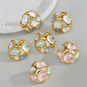 Elegant irregular pleated round enamel earrings with golden frame and pearly texture