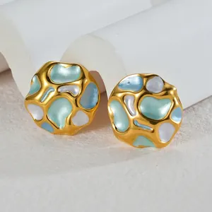 Detailed macro view of irregular pleated round earrings with colorful enamel oil finish
