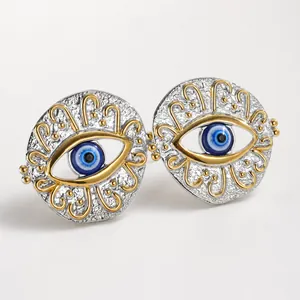 Boucles d'oreilles œil protecteur bohème avec base argentée et centre en émail bleu