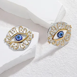 Boucles d'oreilles bohèmes œil protecteur en métal argenté et bordure dorée perlée