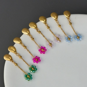 Elegant gold shell stud earrings with colorful crystal flower drops on long gold chains