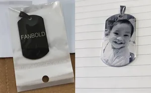 Customized stainless steel dog tags featuring matte black coating and photo engraving