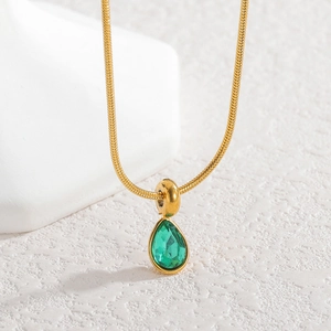 Minimalist gold snake chain necklace with a drop-shaped green zircon crystal pendant