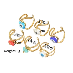Detailed view of six gold-plated evil eye rings set with dimensions and weight info