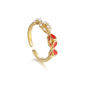 Adjustable golden ring with asymmetrical pearl bow and red enamel heart design