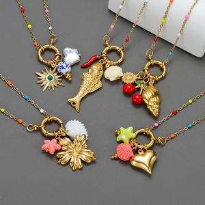 Colorful beaded necklace with gold sea shells and heart charms in a sweet Korean style