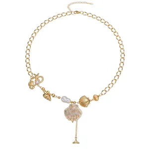 Gold chain ocean theme necklace with shell, starfish pendants and baroque pearls