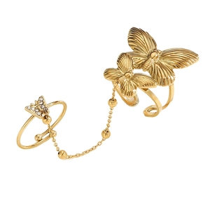 Vintage gold butterfly double chain ring for women with rhinestones on white backdrop