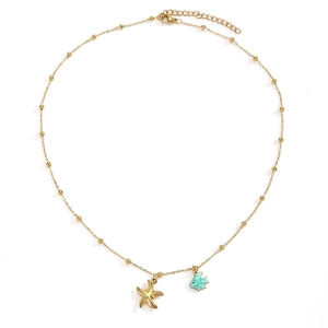 Golden beaded ocean necklace with a textured starfish and turquoise fish pendant