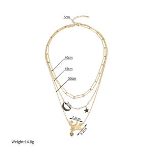Three-layer gold stainless steel necklace with celestial moon and star charms