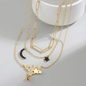 Exquisite layered gold stainless steel necklace with sparkling moon and star pendants