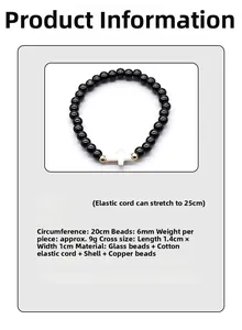 Detail showing 6mm black glass beads and white shell cross on an elastic prayer bracelet