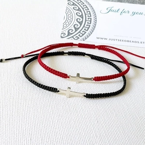 Handmade woven cross bracelets in red and black with adjustable cords for couples