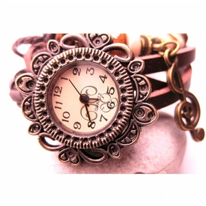Vintage multilayer leather wrap watch with musical note pendant and hollowed bronze case