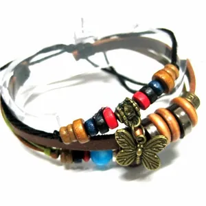Detail view of multi-layer leather bracelet with colorful beads and butterfly charm