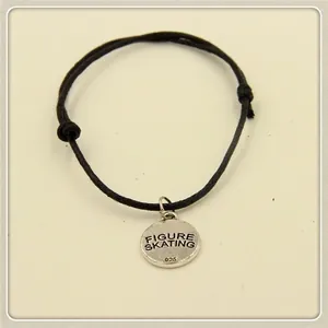Minimalist figure skating braided bracelet with a 925 sterling silver engraved charm