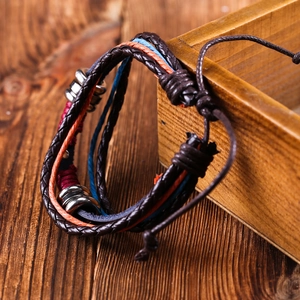 Handmade multilayer braided leather bracelet with vintage beads and adjustable sliding knot