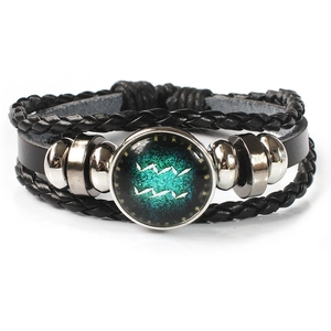Detail of multi-layer leather bracelet featuring Aquarius constellation glass gem charm