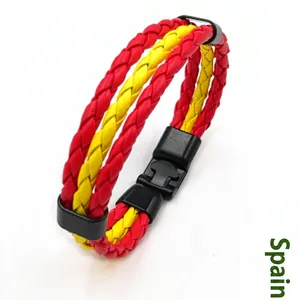 Detail view of Spain flag themed red and yellow woven leather bracelet with black clasp