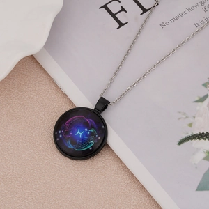 Detailed macro view of a Pisces constellation necklace with purple starry sky pendant
