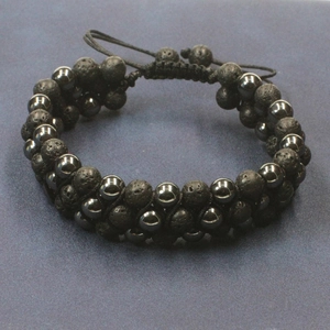 Three-layer braided lava stone and hematite beaded bracelet with adjustable black cord
