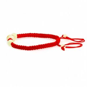 Handmade red cord bracelet with luminous green beads and adjustable woven string design