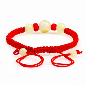 Handmade red string zodiac bracelet with luminous white beads and golden pattern