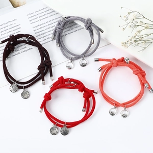 Pulseras magnéticas para parejas de cuerda trenzada con dijes de planetas y sonrisas