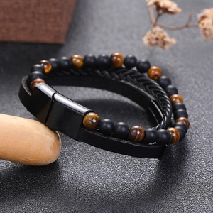Multi-layer men's bracelet with black leather, tiger eye stones, and magnetic buckle