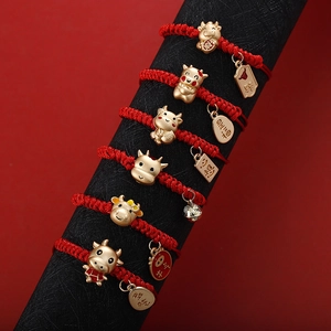 Pulseras trenzadas rojas con dijes de buey dorado regalo de suerte para año nuevo